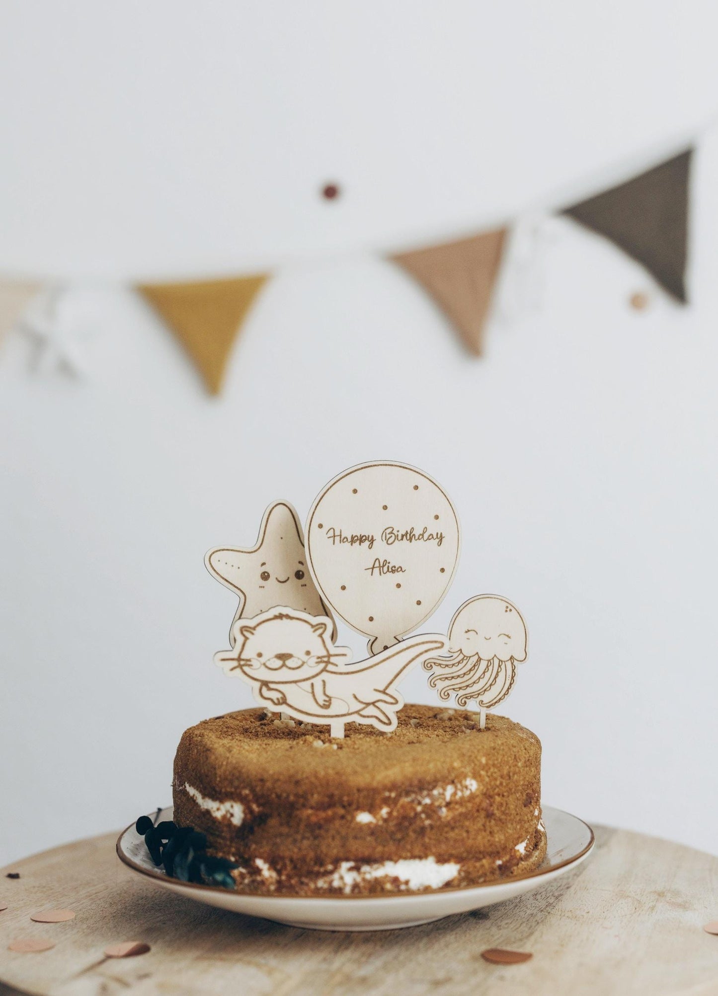 Wooden Otter cake topper