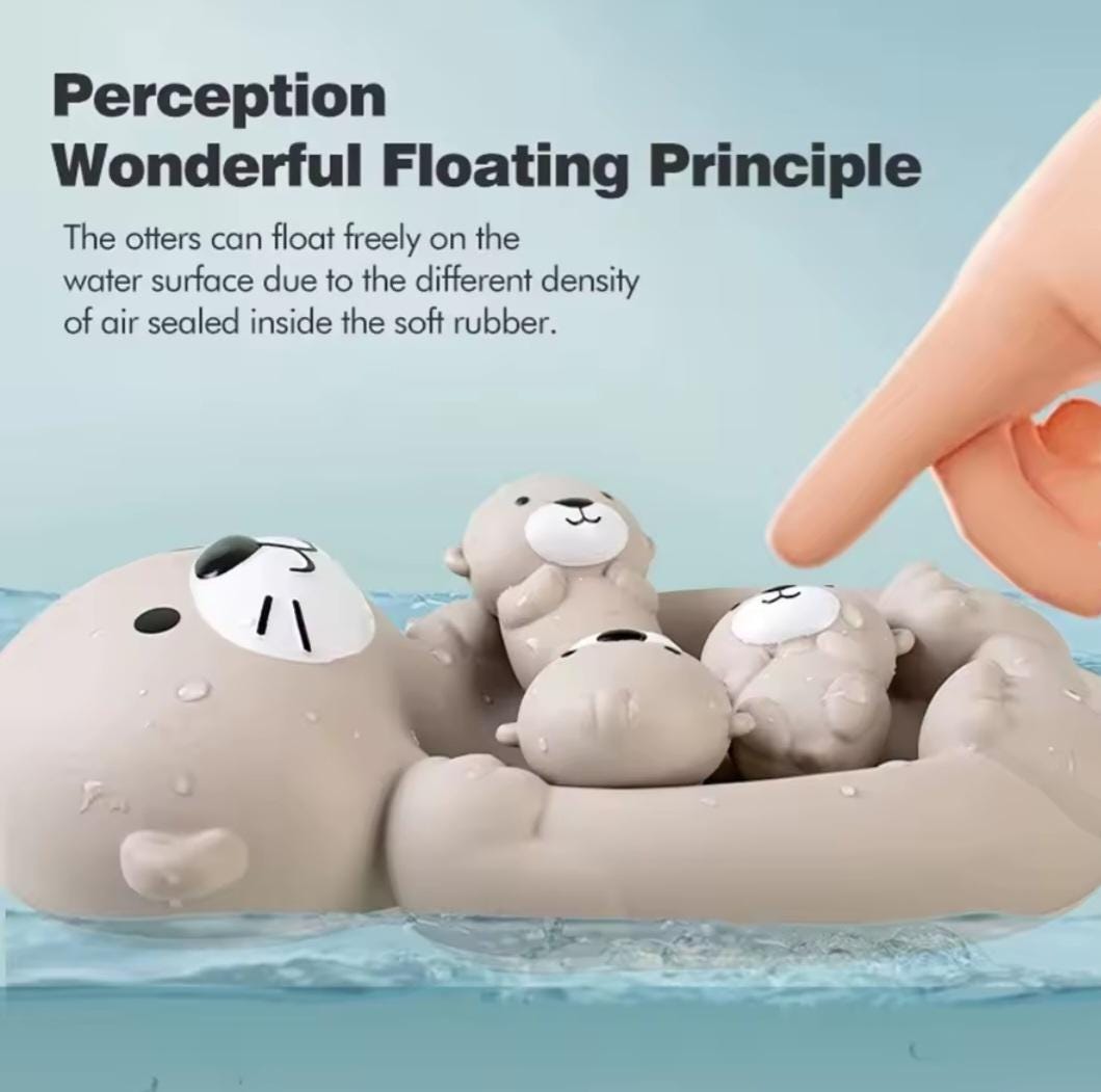 Otter family bath toy