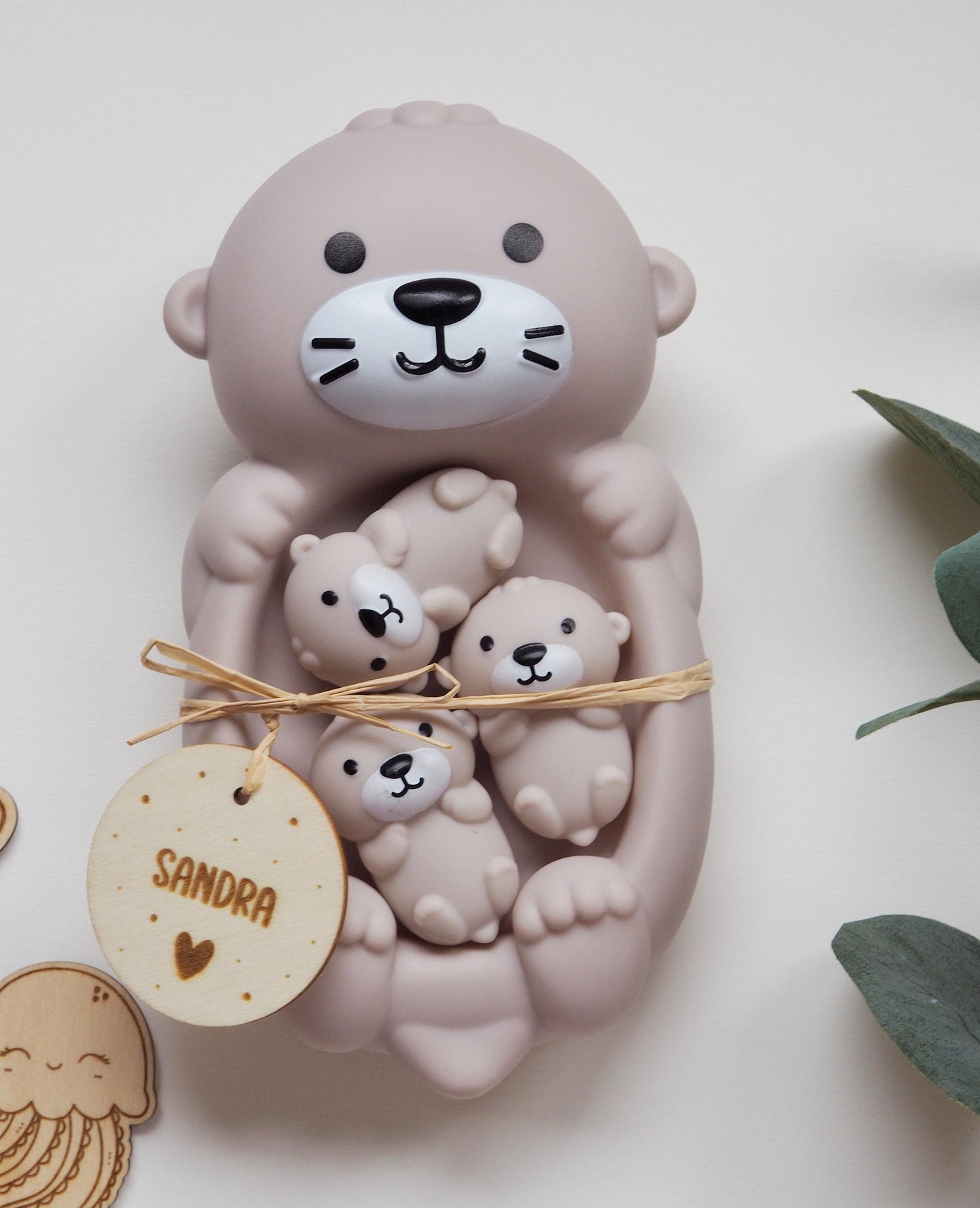 Otter family bath toy