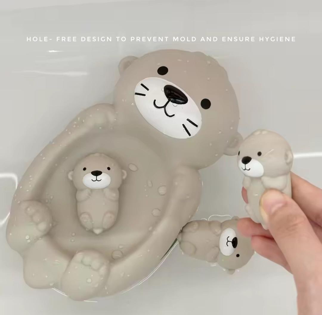 Otter family bath toy