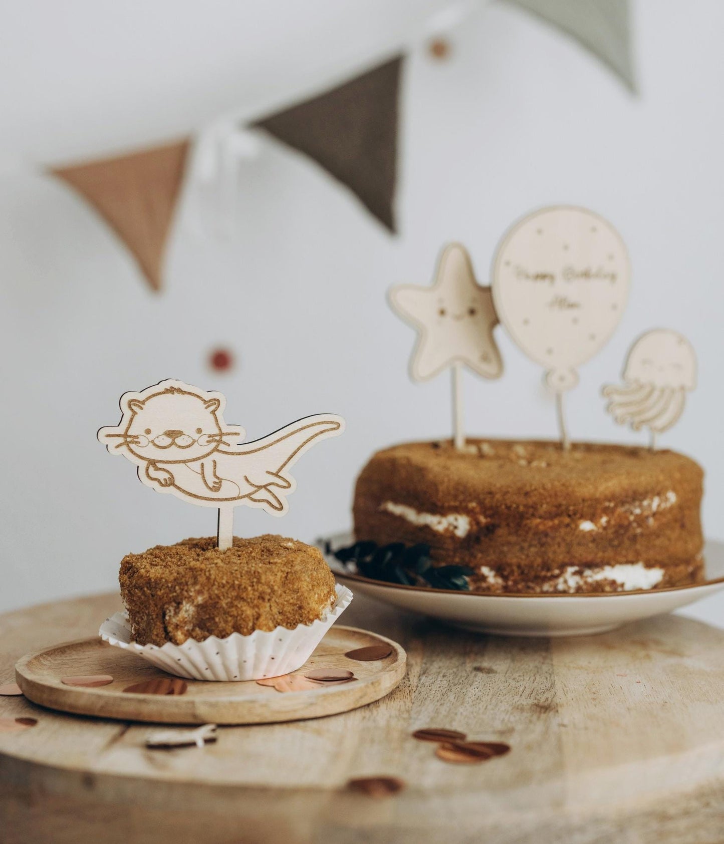 Wooden Otter cake topper
