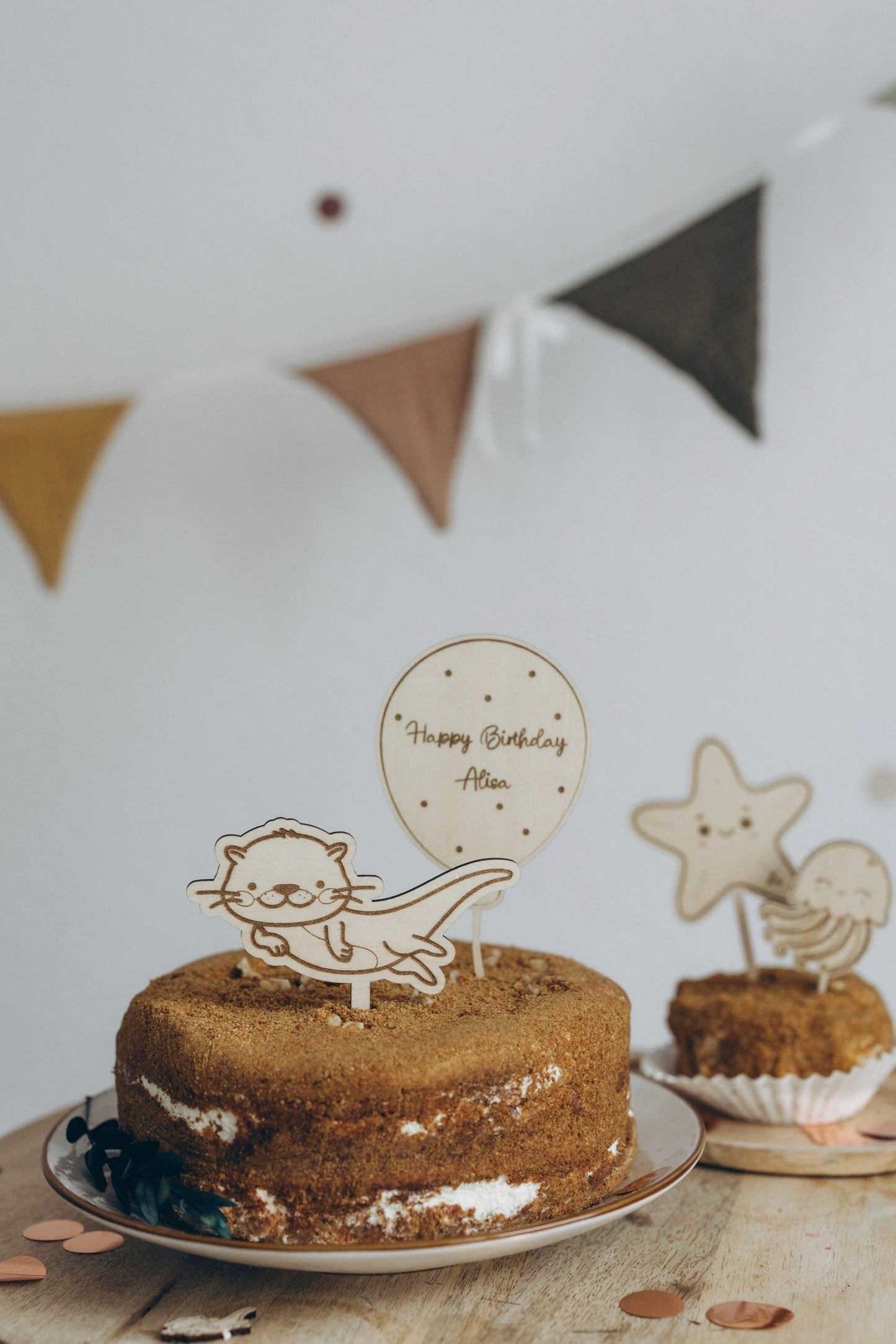 Wooden Otter cake topper