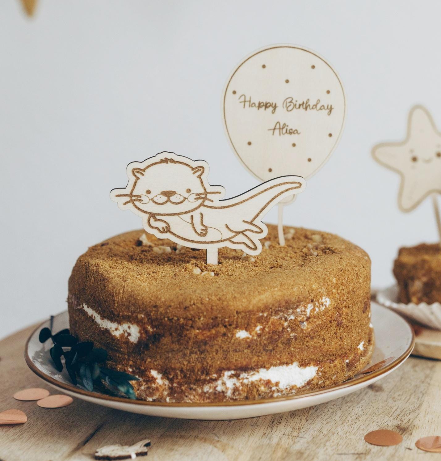 Wooden Otter cake topper